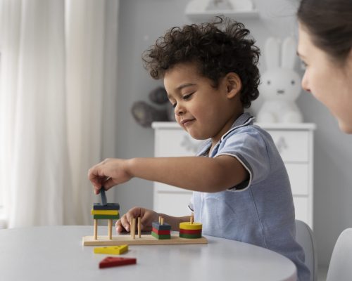 close-up-child-enjoying-didactic-game