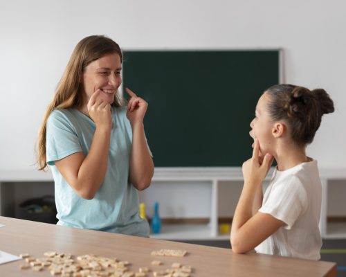 psychologist-helping-girl-speech-therapy